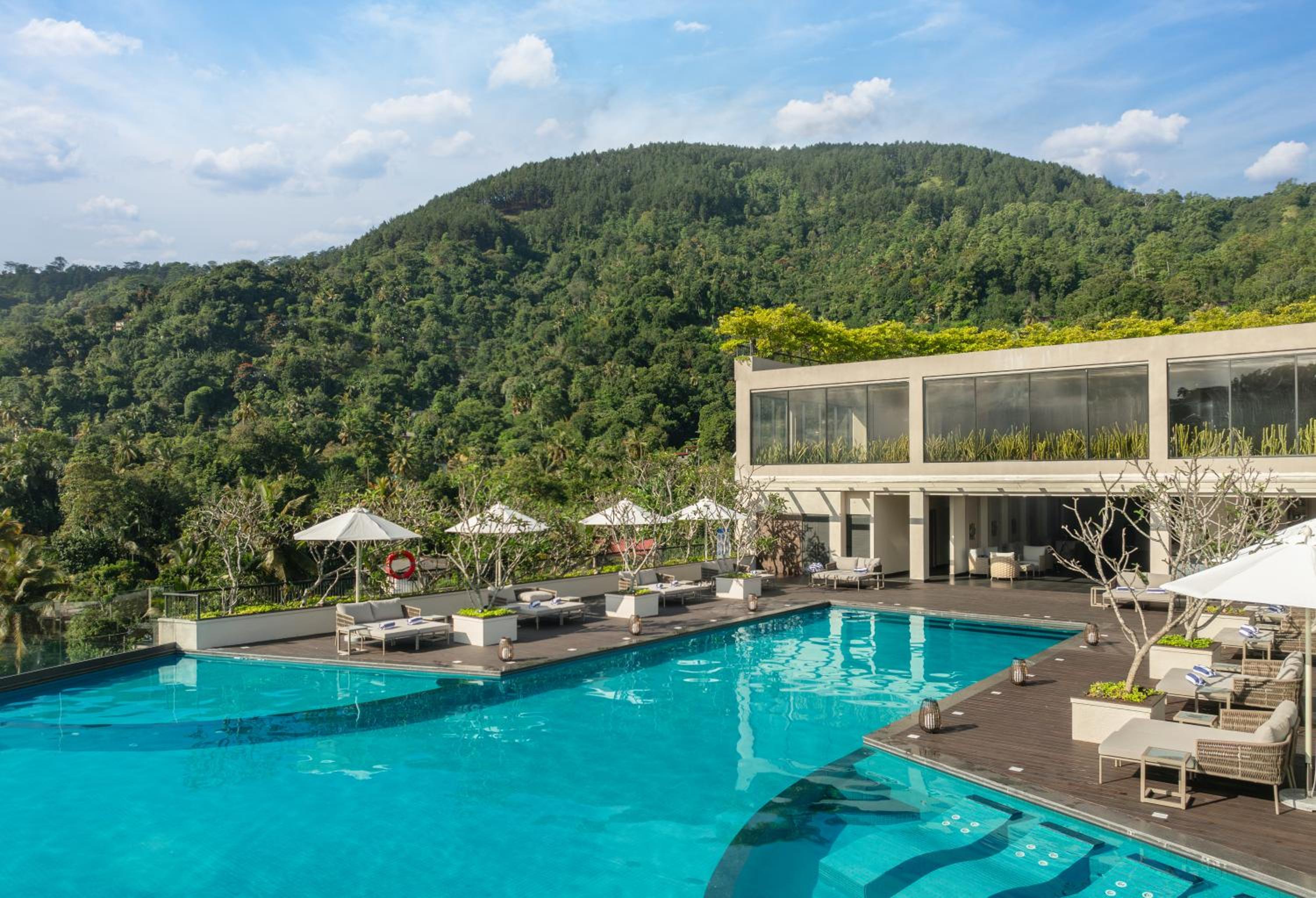 The Golden Crown Hotel — Infinity pool · Rooftop bar